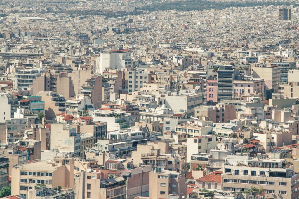 Aerial view of densely packed apartment and office buildings in Athens
