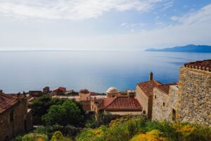 Stone rooftops of Monemvasia old town above the sea in Laconia, Greece