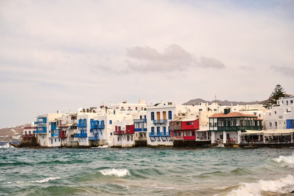 Waterfront houses built over the sea in Mykonos town, Greece