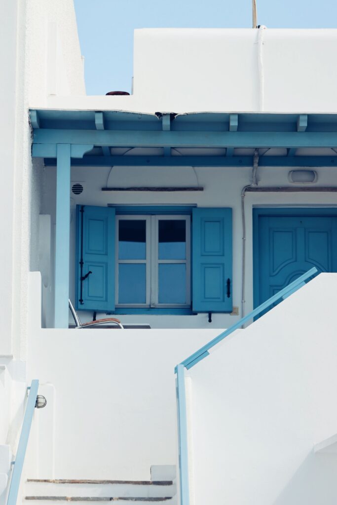 White Cycladic houses with blue details on the island of Naxos, Greece